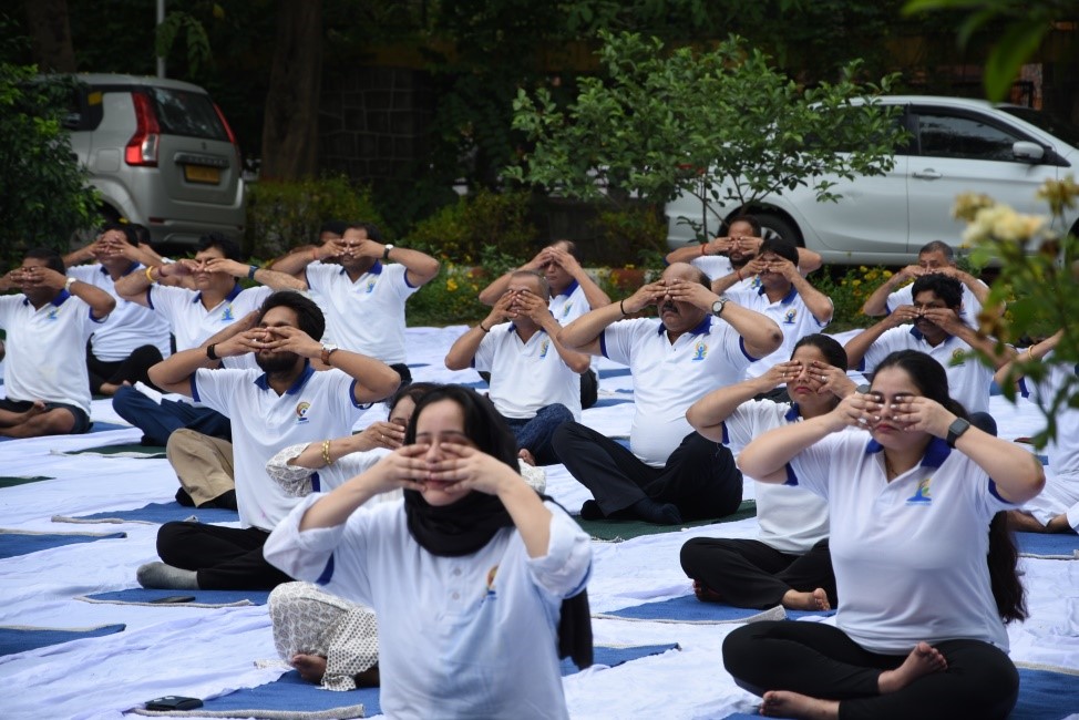 Ministry of Women and Child Development Officials joined yoga program to celebrate the 9th International Day of Yoga, held at NIPCCD promoting physical and emotional well-being.